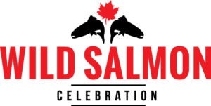 A logo for the Wild Salmon Celebration including two salmon and a maple leaf